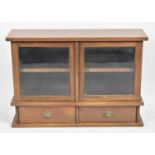 A Mid 20th Century glazed Table Top Cabinet with Two Base Drawers, 80cms Wide and 55cms High