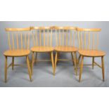 A Set of Four Vintage Polish Spindle Back Kitchen Chairs by ZPM Radomsko