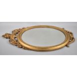 A Mid 20th Century Gilt Plastic Ornament Oval Framed Wall Mirror, 76x40cm Overall