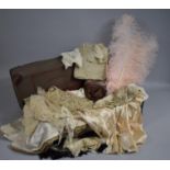 A Collection of Early Lace, Silks, Fabric, Feathers etc