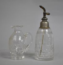 A Baccarat Glass Perfume Atomiser together with an Engraved Glass Whisky Noggin Jug, The Latter 9cms