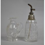 A Baccarat Glass Perfume Atomiser together with an Engraved Glass Whisky Noggin Jug, The Latter 9cms