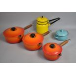 A Set of Three Le Creuset Lidded Cooking Pots, Enamelled Pot Etc, In Worn Condition and One Lid with