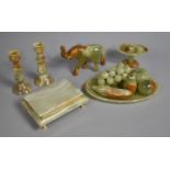 A Collection of Carved Polished Onyx Items to Include Artificial Fruit, Cigarette Box, Candles