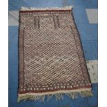 A Handwoven Patterned Rug, 125x82cm