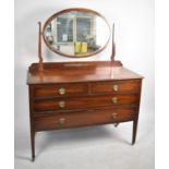 An Edwardian Mahogany Dressing Chest with Two Short and Two Long Drawers, Oval Mirror, 115cm wide