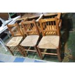 A Set of Three Rush Seated Spindle Back Side Chairs