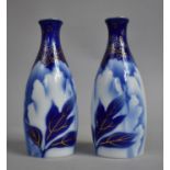 A Pair of Japanese Porcelain Blue, White and Gilt Decorated Bottle Vases, 14cm High