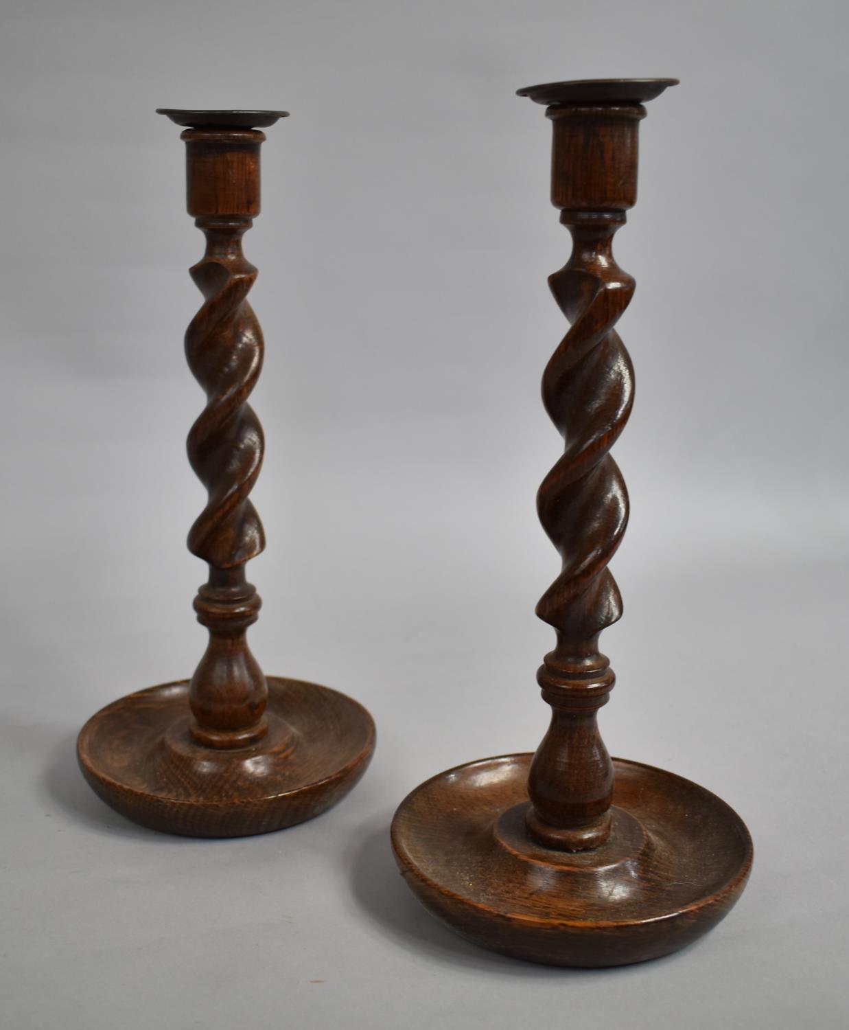 A Pair of Edwardian Oak Candlesticks on Circular Dished Trays, 31cms High - Image 2 of 2