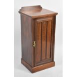 An Edwardian Mahogany Galleried Bedside Cabinet with Panelled Door to Shelved Interior, 38cms Wide