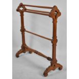 A Late Victorian/ Edwardian Gothic Style Mahogany Towel Rail, 76cms Long