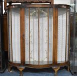 A Mid 20th Century Serpentine Fronted Walnut Display Cabinet, 103cm wide