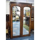 A Late Victorian Walnut Mirror Fronted Double Wardrobe, 121cm wide