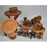 A Collection of Various Wooden Souvenir Items to Comprise African Elephants, Plates, Vase Etc