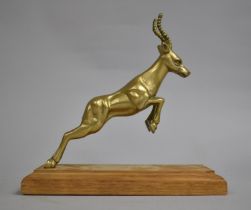 A Brass Study of a Leaping antelope on Modern Rectangular Oak Plinth, 19cms Long