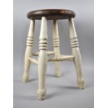 A Vintage Circular Topped Stool with Cream Painted Base, 47cms High