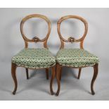 A Pair of Late Victorian Balloon Back Serpentine Front Bedroom Chairs