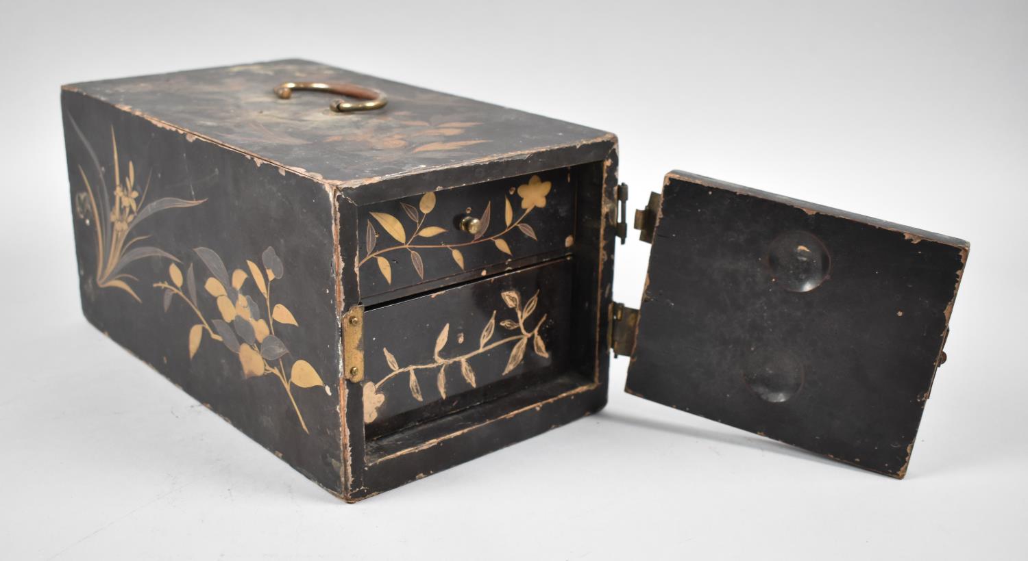 A Chinese Lacquered and Gilt Decorated Two Drawer Collectors Chest with hinged Door, Hinges and - Image 2 of 3