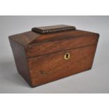 A 19th Century Mahogany Two Division Tea Caddy of Sarcophagus Form, Missing Bun Feet, 20cms Wide