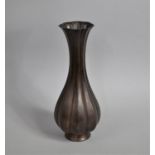 A Chinese Bronze Segmented Vase, Missing Mount, 36cms High