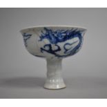 A Reproduction Blue and White Chinese Stem Cup Decorated with Dragons, 11cm high