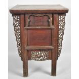 A Chinese Elm Cabinet with Single Drawer and Pierced and Carved Panels, 63cms Wide and 87cms High