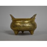 A Chinese Brass Censer on Tripod Support, Engraved Decoration, 9.5cm high