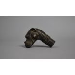 A Reproduction Bronze Walking Stick Handle in the Form of a Dog, 7cms High