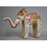 A Mid 20th Century Carved Wooden Hand Painted Indian Elephant, 36cm High