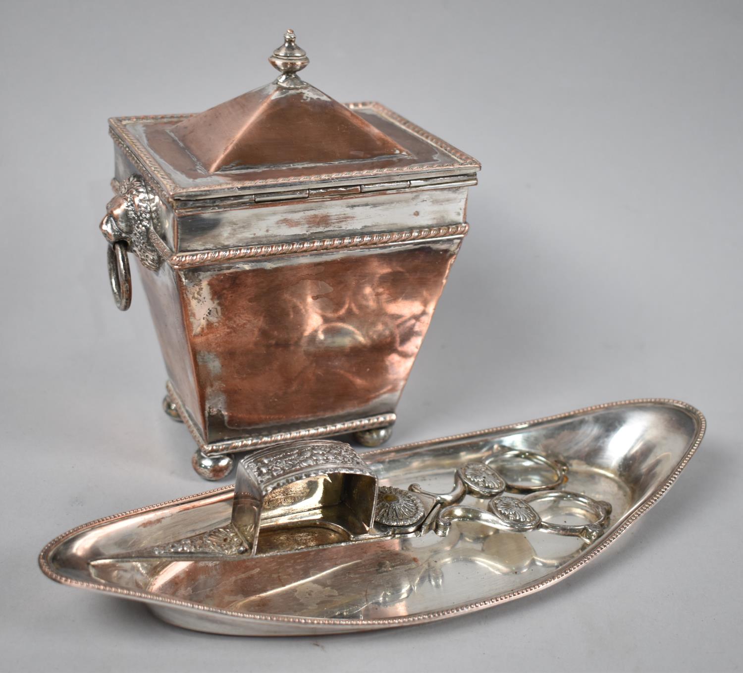 A 19th Century Sheffield Plated Sarcophagus Tea Caddy with Lion Mask Ring Handles Together with a