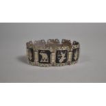 A Thai Silver Sectional Bracelet with Deity Cartouches