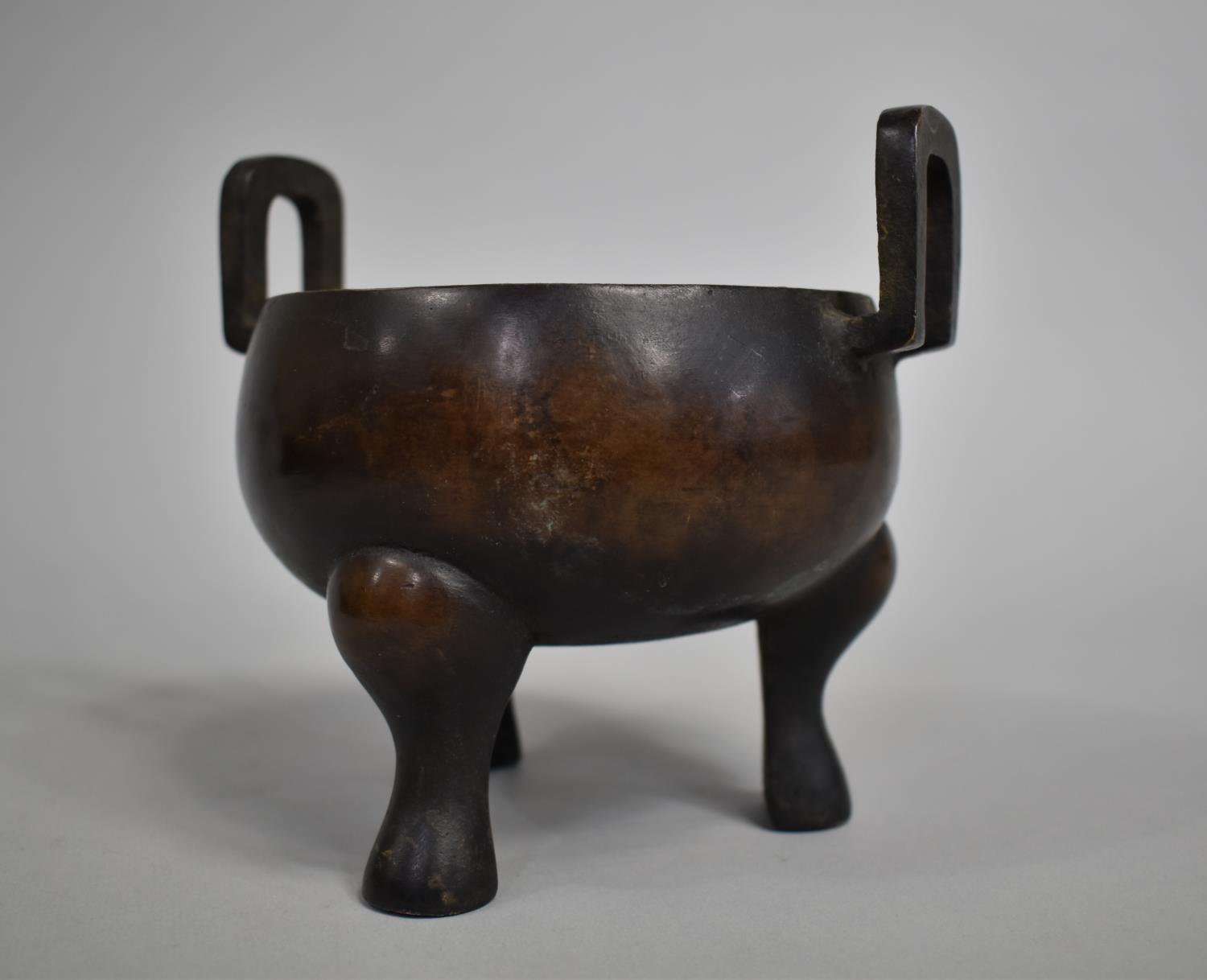 A Chinese Bronze Tripod Censer with Twin Carry Handles, 13cm high - Image 3 of 5