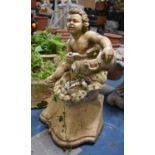 A Reconstituted Stone Garden Water Feature in the Form of a Seated Cherub