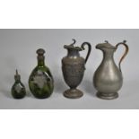 Two Pewter Mounted Lidded Jugs and Two Pewter Mounted Green Glass Decanters