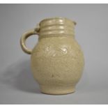 An Oxshott Pottery Stoneware Jug with Incised Bird Decoration, 21cm high