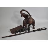 A Collection of Carved African Souvenir Elephant Ornaments and a Walking Stick, Panel etc