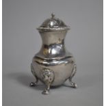 A Chinese Silver Pepper Pot on Four Scrolled Feet, 10cm High