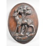 A Carved Black Forest Oval Wall Hanging Decorated with Stag in Relief, Small Condition issue to