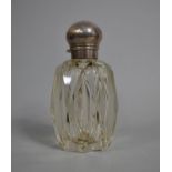 A Silver Topped Glass Perfume Bottle, Missing Inner Stopper, 15cm high