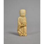 An Oriental Ivory Figure of a Carved Kneeling Buddha, 7cm high