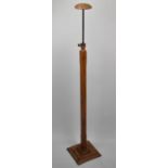 An Edwardian Oak Milliners Shop Hat or Wig Stand with Rise and Fall Mechanism and Stepped Square