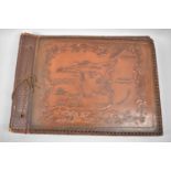 An Interesting Leather Photograph Album, The Cover Decorated in relief with Trinidad, Tobago and the