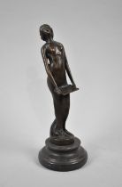 A Reproduction Bronze Desk Top Figure of Nude Carrying Tray, Stepped Circular Base, 19cms HIgh