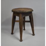 A Vintage Circular Topped Stool with Turned Supports, 31cms Diameter and 46cms HIgh