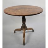 A 19th Century Oak Former Snap Top Circular Table on Tripod Base, 84cms Diameter