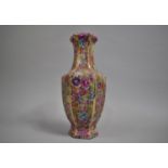 A Large Chinese Hexagonal Vase, Decorated with Flowers in Multicoloured Enamels, 35cms high