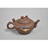 A Modern Oriental Yixing Teapot Decorated with Young Monkeys Climbing to Reach Fruit on Lid, Seal