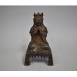 A Far Eastern Bronze Study of Seated Buddha on Four Legged Throne, 21cms High