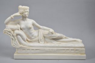 A Modern Resin Study of Reclining Classical Topless Maiden holding Apple, "Eve", on Rectangular