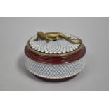 A Circular Decorated Porcelain Box with Bronze Lizard Mount, 14cms Diameter